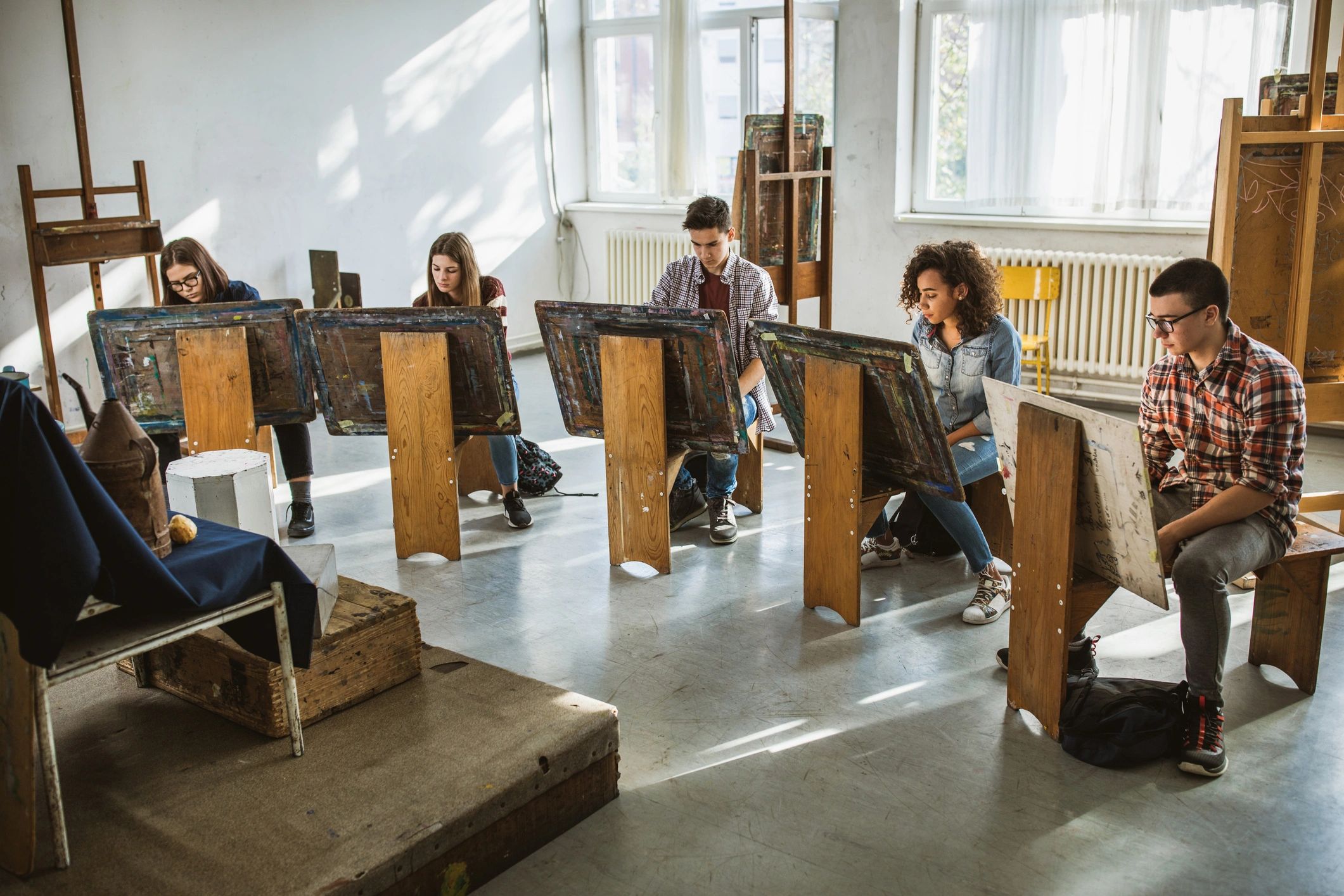 Students working together in an art studio class